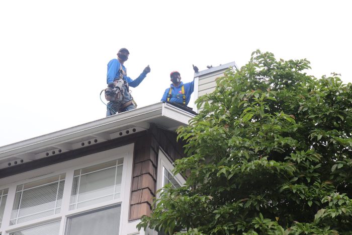 Skagit Roofing LLC Working On A Mount Vernon Hillside Townhome Complex 